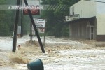 Flooded road and parking lots