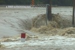 Flood flows over parking lot