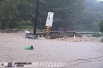 Flood overflows onto bridge