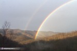December double rainbow and mountains