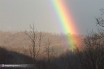 December double rainbow and mountains