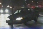 Car skids on ice into curb
