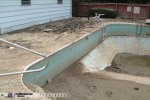 Mud-filled pool after flood