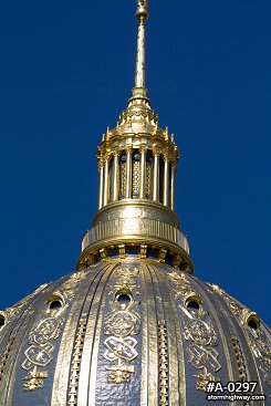 WV State Capitol gold dome and blue sky, vertical shot