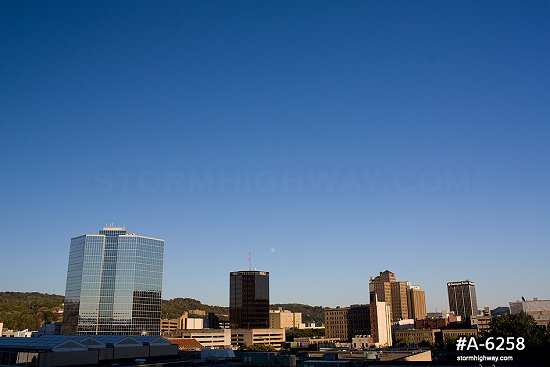 Downtown Charleston skyline under clear skies, looking east