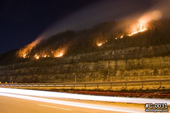 Wildfire near highway traffic
