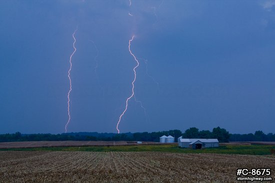 Daylight lightning over farm