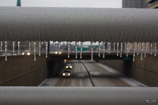 Icicles on a guardrail over Interstate 70 during an ice storm in downtown St. Louis