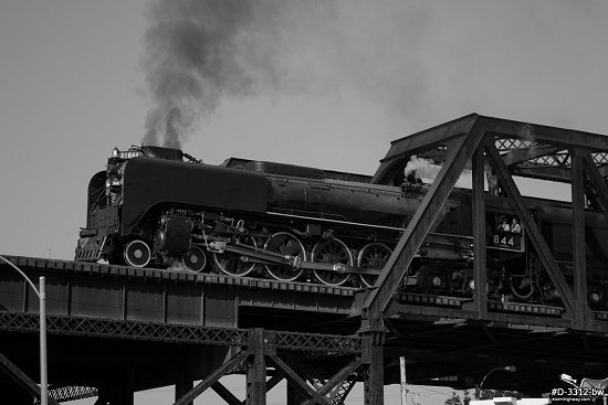 Union Pacific steam locomotive No. 844 on the MacArthur Bridge in St. Louis, black and white