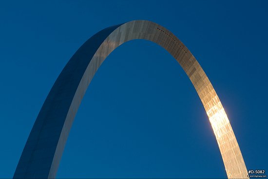 Blue sky and sunlight reflecting in the Gateway Arch