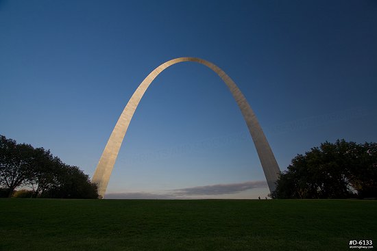 Blue sky over the Gateway Arch and grounds on a late summer evening in St. Louis