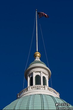 Flag on top of the Old Courthouse, vertical view with blue sky