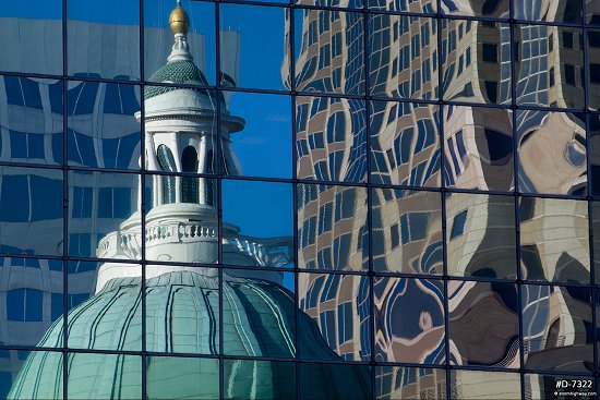 Old Courthouse and One Metropolitan Square reflecting in building windows