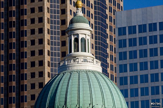 Close up of the top of Old Courthouse with One Metropolitan Square in the background