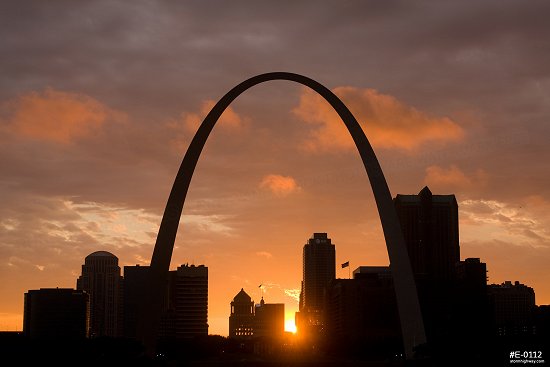 A golden sunset over the Gateway Arch and downtown St. Louis, MO