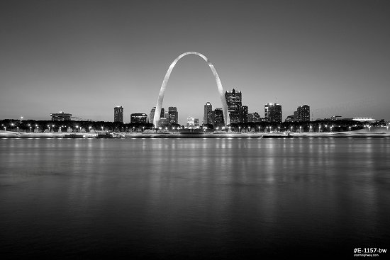 Evening twilight over the Gateway Arch, Mississippi riverfront and downtown St. Louis, MO, black and white