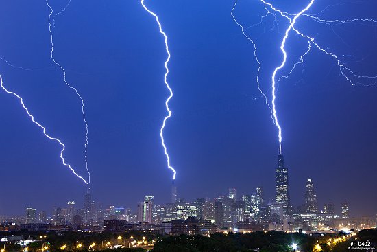 Chicago triple lightning strikes the Sears Tower, Trump Tower, and John Hancock Center at the same time in Chicago, Illinois