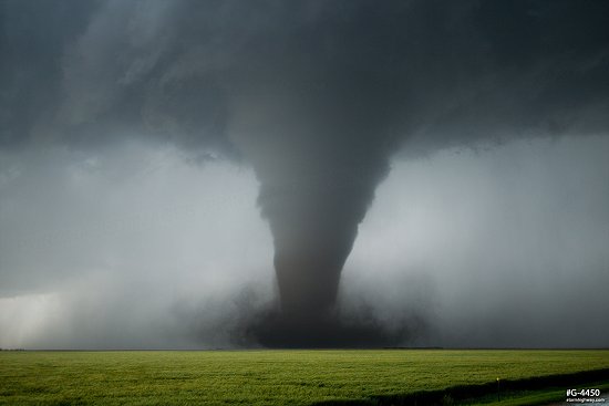 A majestic, classic strong tornado over the prairie near Dodge City, Kansas