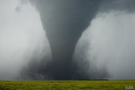 A majestic, classic strong tornado over the prairie near Dodge City, Kansas