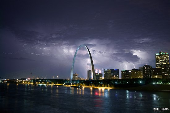Lightning and St. Louis skyline at night during Cardinals win